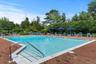 Community pool featuring a patio area