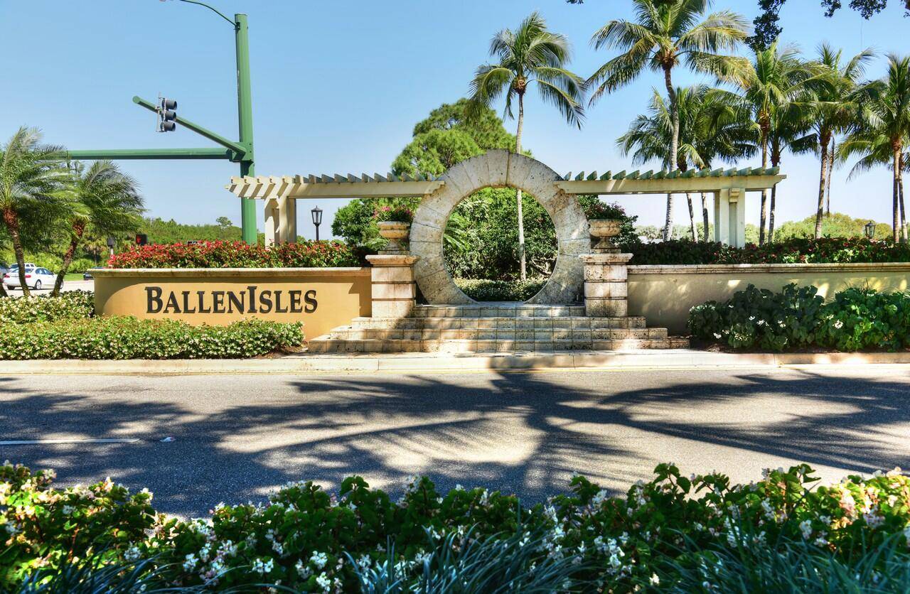 Immerse yourself in opulence with this exquisite single level residence in the esteemed Ballenisles community.