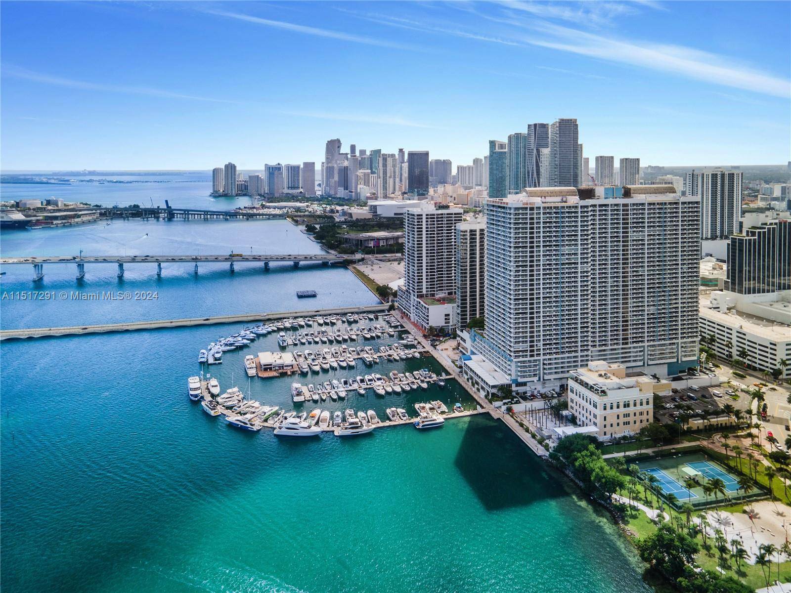 This luxury three bedroom, three bath condo features stunning views of Biscayne Bay and Downtown Miami.