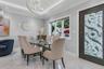 Dining area featuring a contemporary chandelier, recessed lighting, crown molding, white tile flooring, and a decorative glass iron entry door
