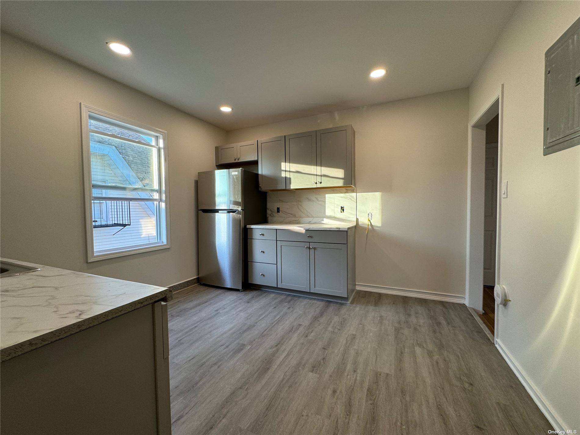 Tons of natural light in this fabulous brand new interior in large 3 bedroom 1 bath with gigantic living room on an upper floor apartment in the heart of N.