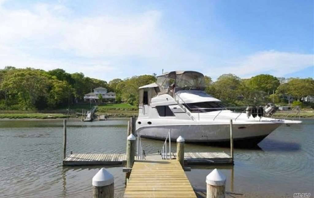 This Superior Mattituck Home Is Situated On The Mattituck Inlet With Deep Water Access Including A Dock With Electric.