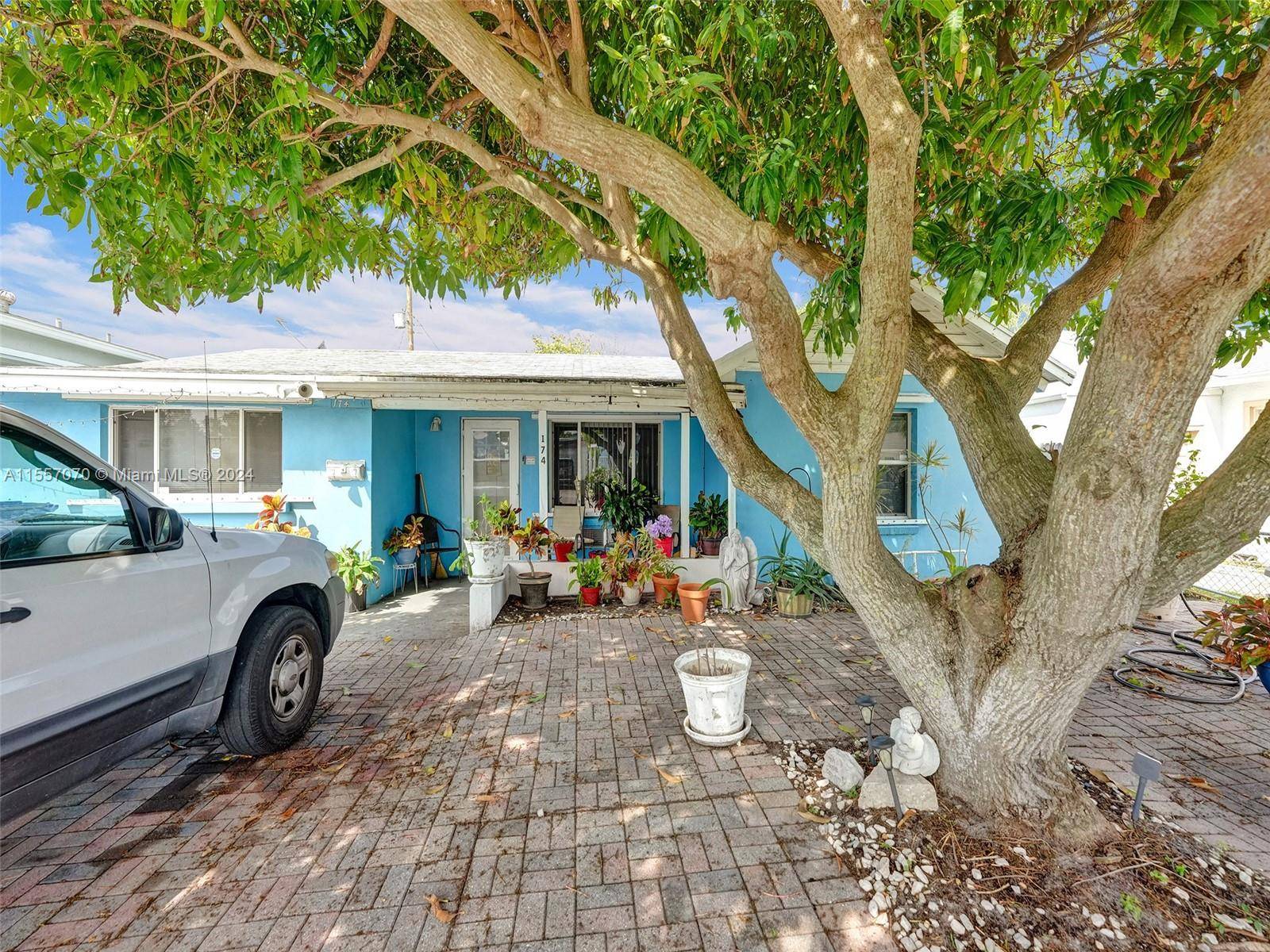 Welcome to 174 E 23rd St, a hidden gem in Rivera Beach with tranquil marina views.
