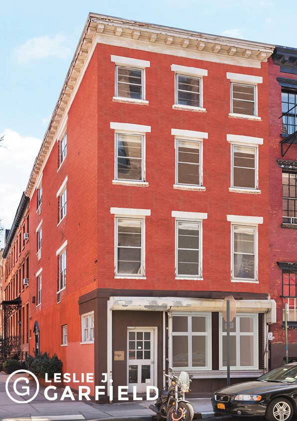 This rare 4 story, mixed use corner townhouse sits on a magnificent cobblestone street in the heart of the West Village's Historic District.