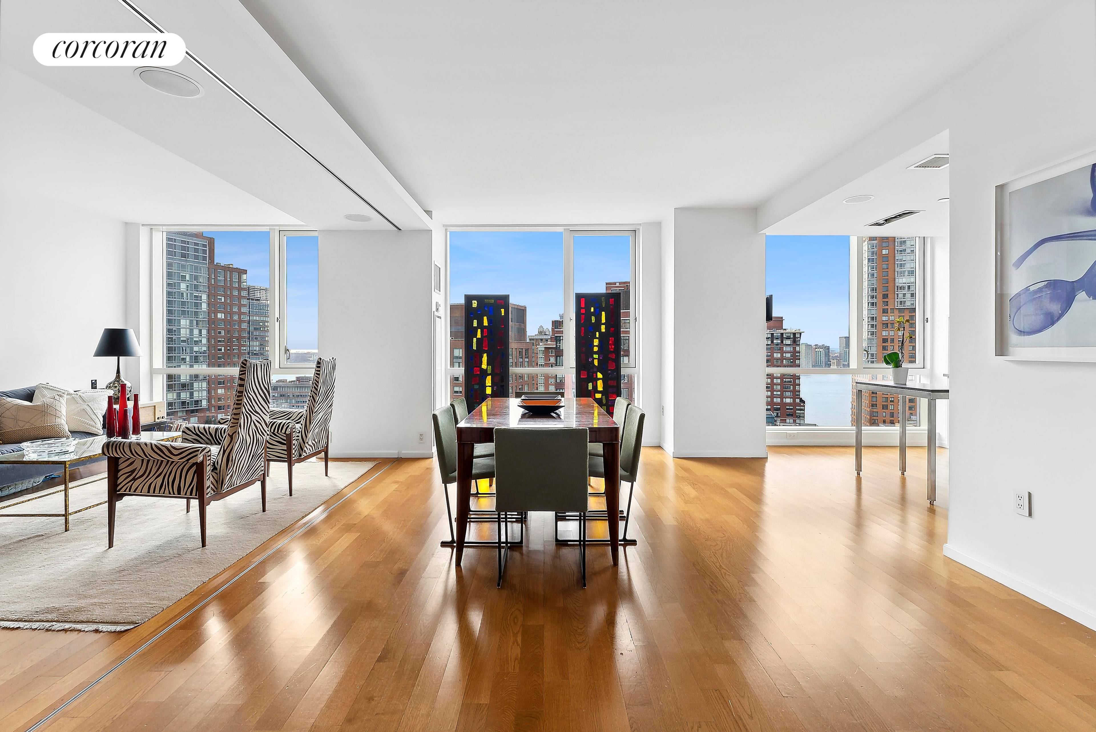 Experience the epitome of luxury living in Tribeca with this stunning 2 bedroom, 2 bathroom condo boasting breathtaking west facing river and city views !