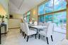 Host memorable gatherings with seamless access between the dining room, patios, and breathtaking natural landscape.