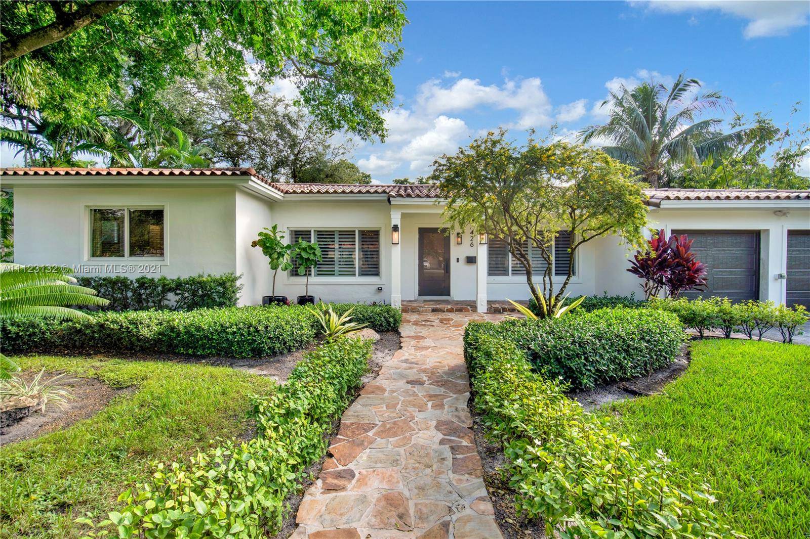 Magazine quality designed house in prime South Gables location completely renovated by the current owner in 2021 with tall vaulted ceilings, an open split floor plan and a huge master ...