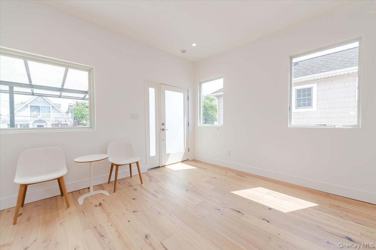 Unfurnished room featuring light wood-style flooring and recessed lighting
