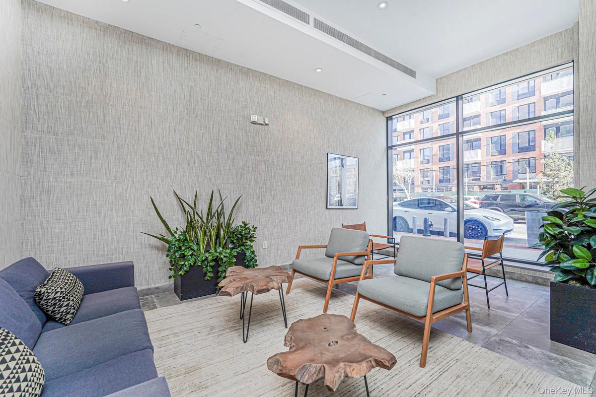 Community lobby with recessed lighting and expansive windows