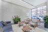Community lobby with recessed lighting and expansive windows