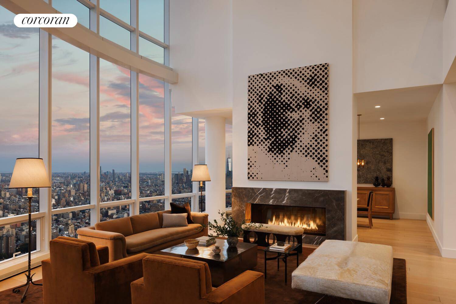 DOUBLE HEIGHT DRAMA WITH SWEEPING VIEWS OF THE NEW YORK CITY SKYLINE FROM EVERY ROOM.