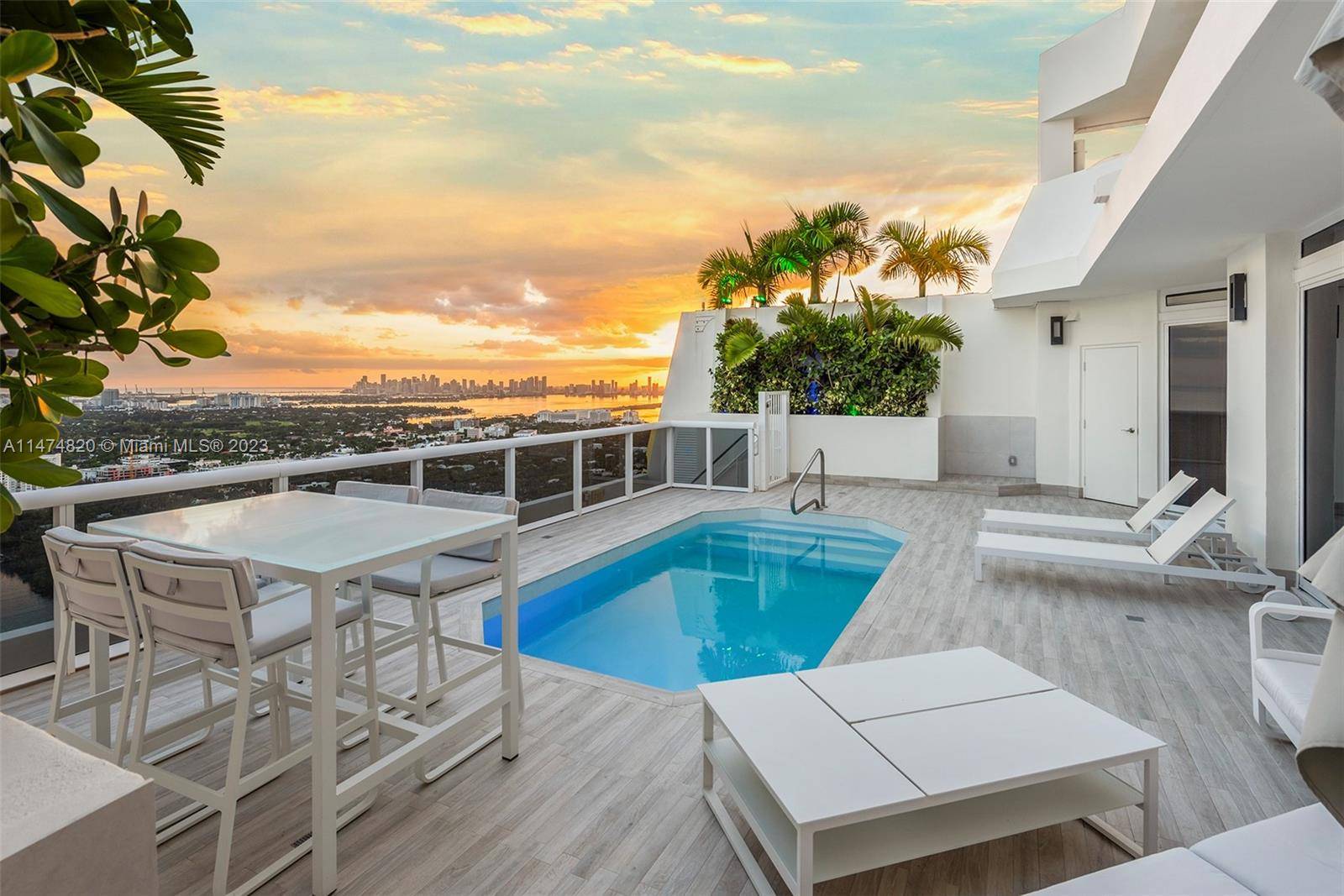 Escape to the epitome of Miami Beach luxury at Tower Suite 4404 a 2 story penthouse where panoramic vistas of the ocean, city skyline, and night lights are just the ...