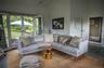 Sitting room with high vaulted ceiling