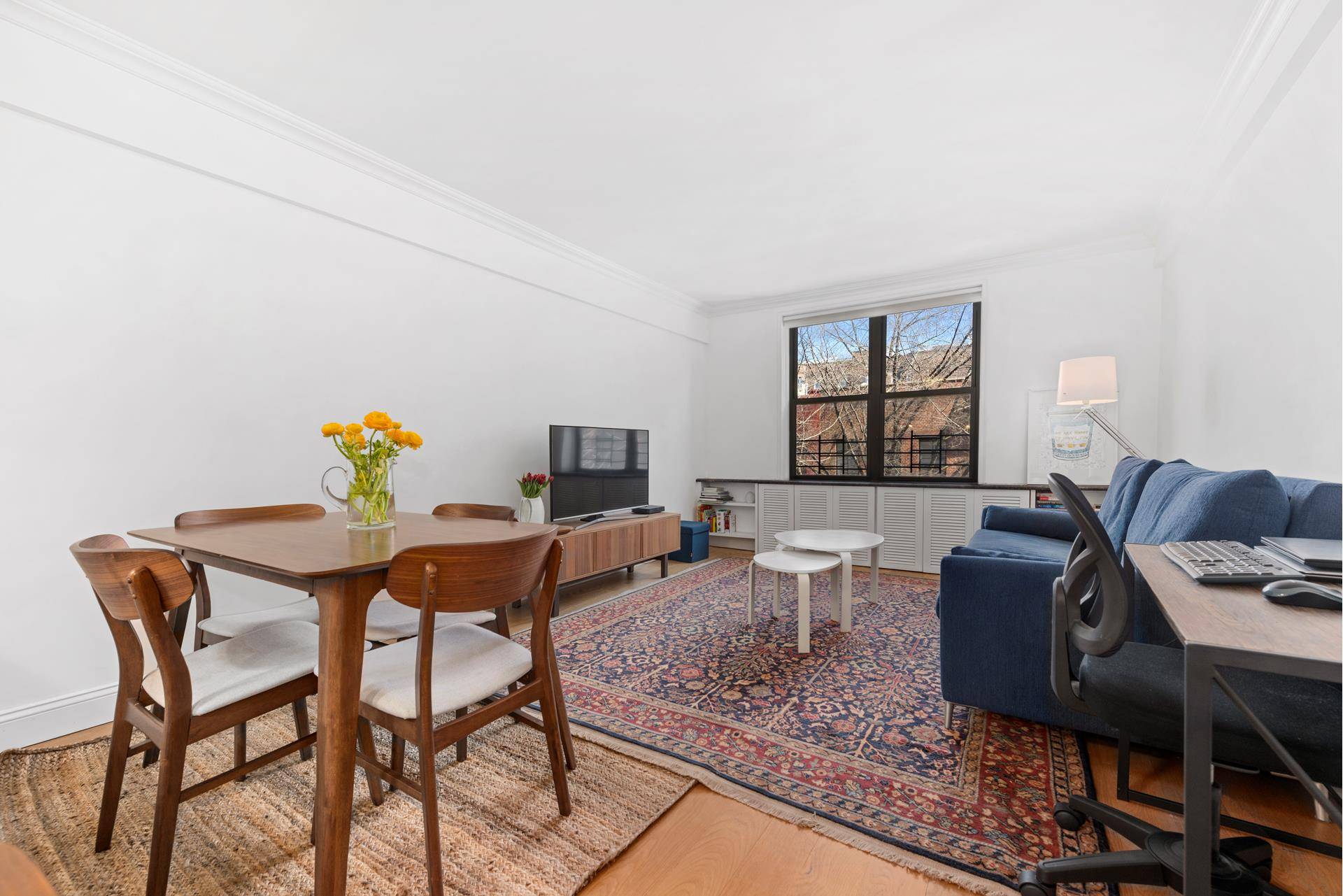 Large and bright upgraded one bedroom home with open chef's kitchen on the 4th floor of the full service 350 Bleecker Street.