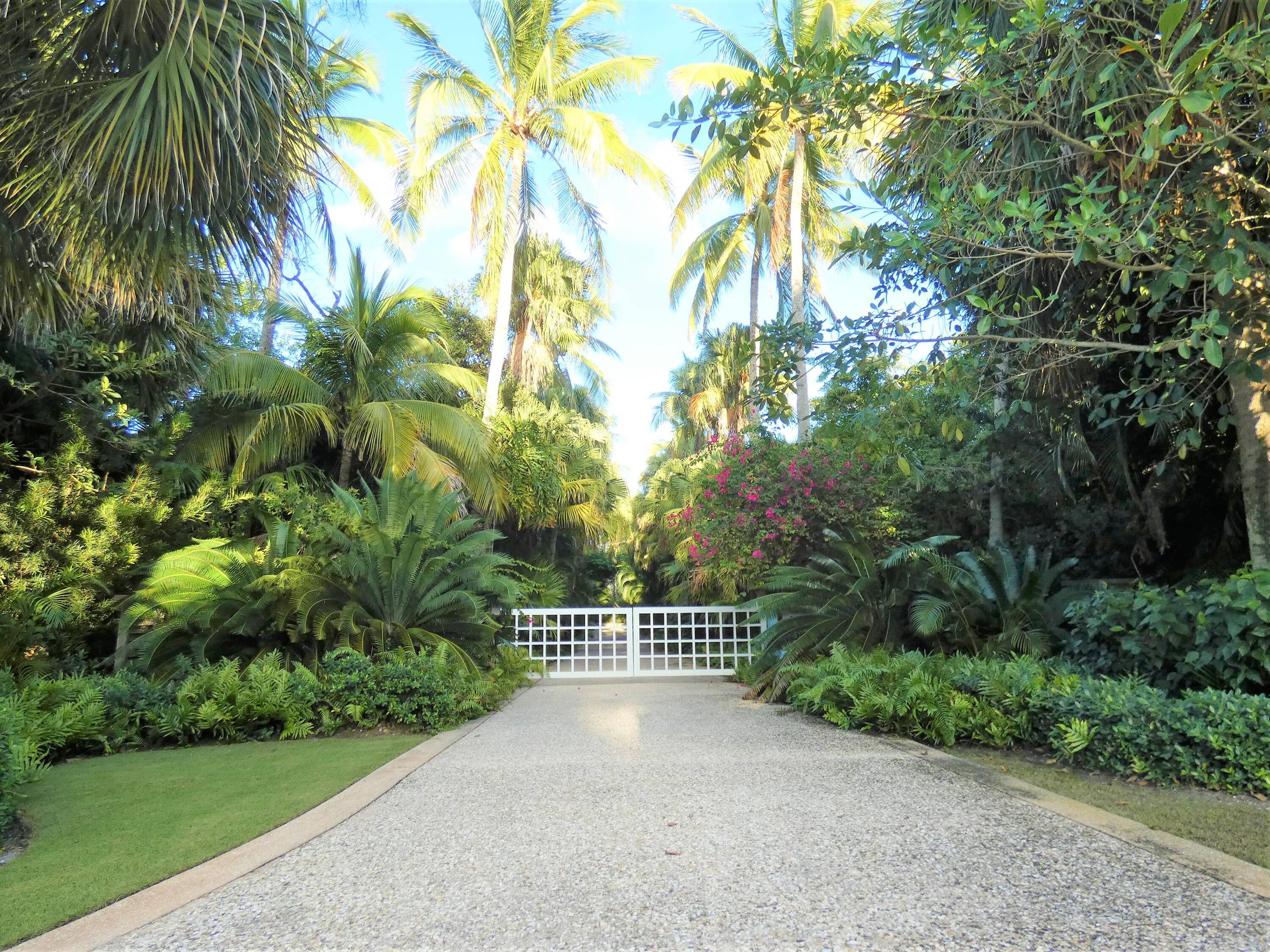 Understated Elegance permeates this Gorgeous Gated Jupiter Island Estate, 5 Bedrooms, 5.