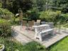 View of patio / terrace featuring view of wooded area