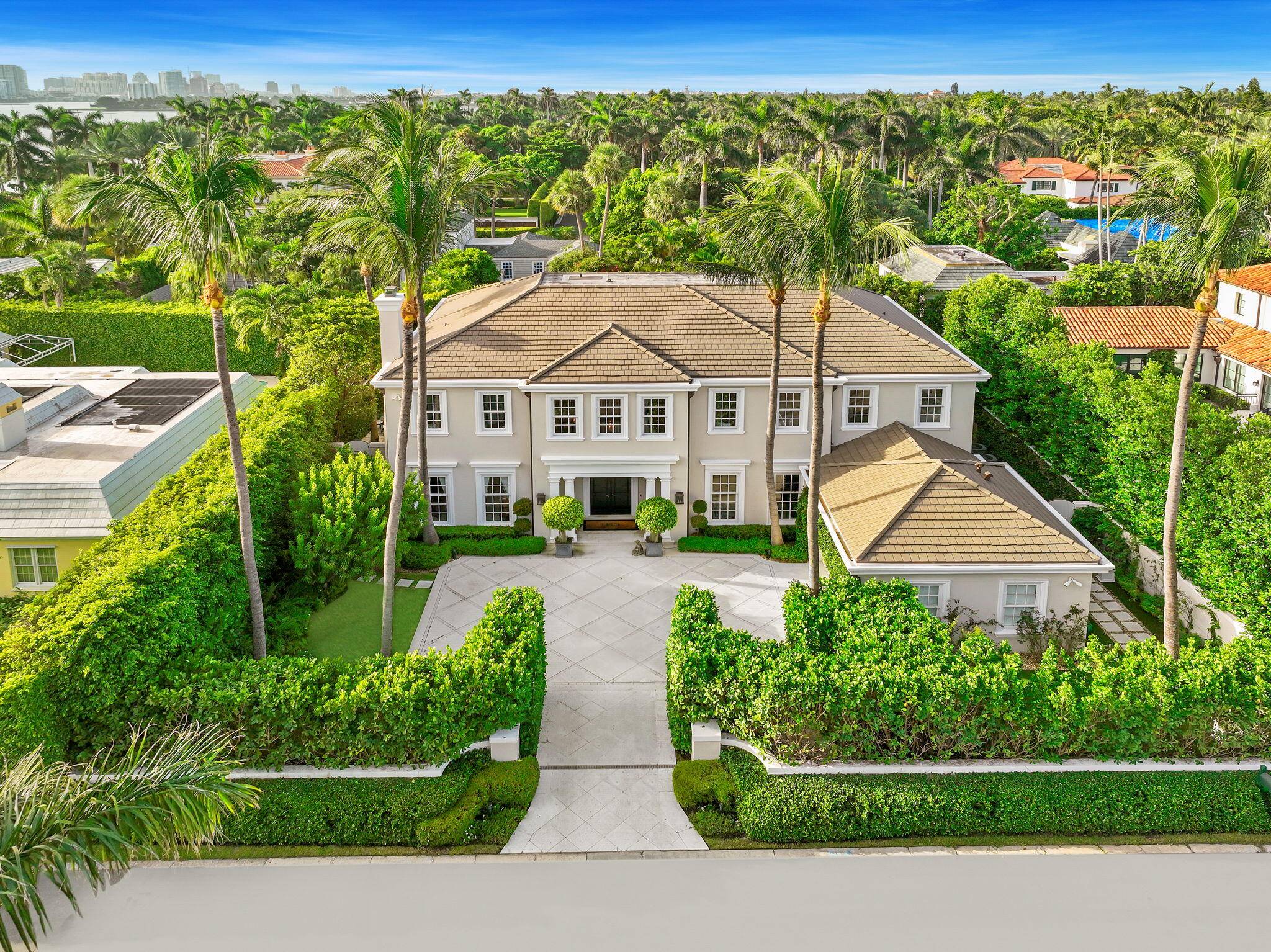 This turnkey 6, 800 sqft Georgian style home in Palm Beach's estate section was designed to feel older but w all modern amenities.