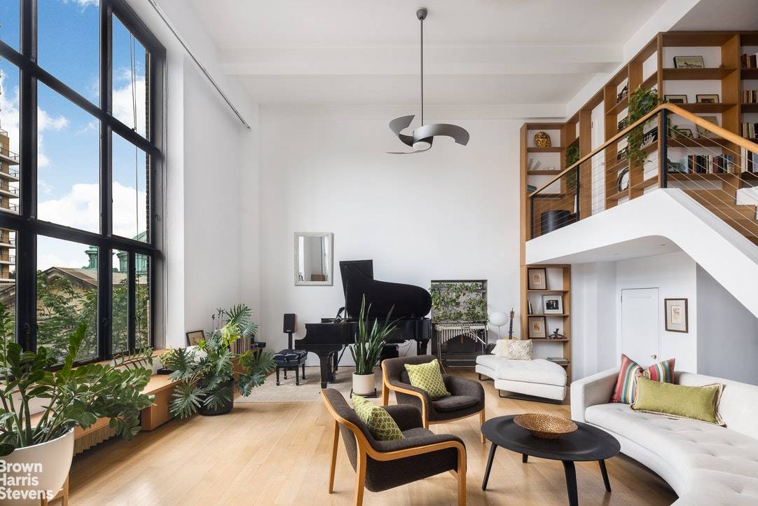 This extraordinary duplex in the iconic Hotel des Artistes cooperative is located near the highly coveted corner of 67th Street and Central Park West.
