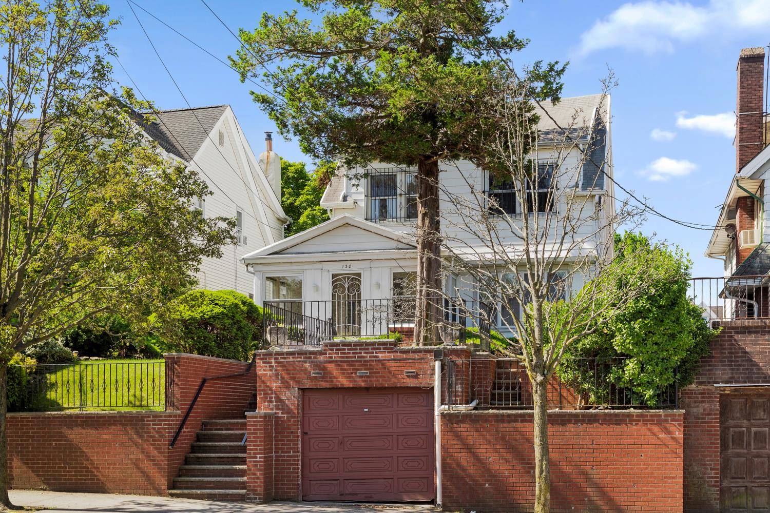 Majestic single family home with private driveway and huge front and back yards now available on one of Bay Ridge's finest blocks.