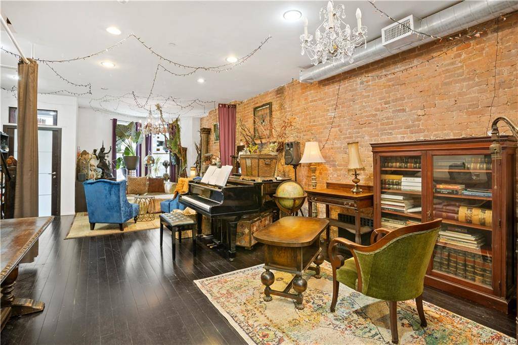 Located in the historic Hamilton Heights landmark, this 18 foot wide, 70 foot deep, modern two family row house sits on one of Harlem's prime blocks.