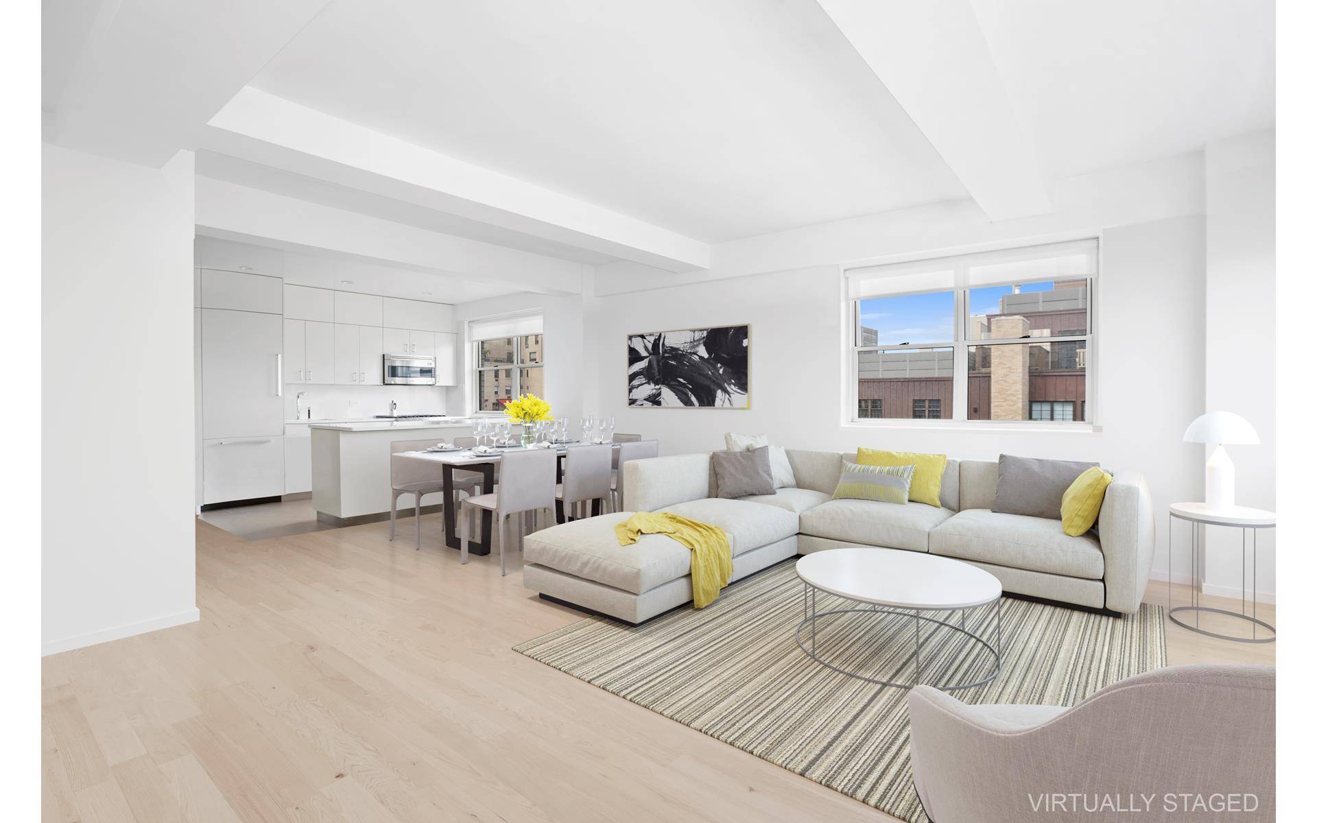 Light and spacious two bedroom plus office in a corner unit with views of landmarks on the Upper East side.