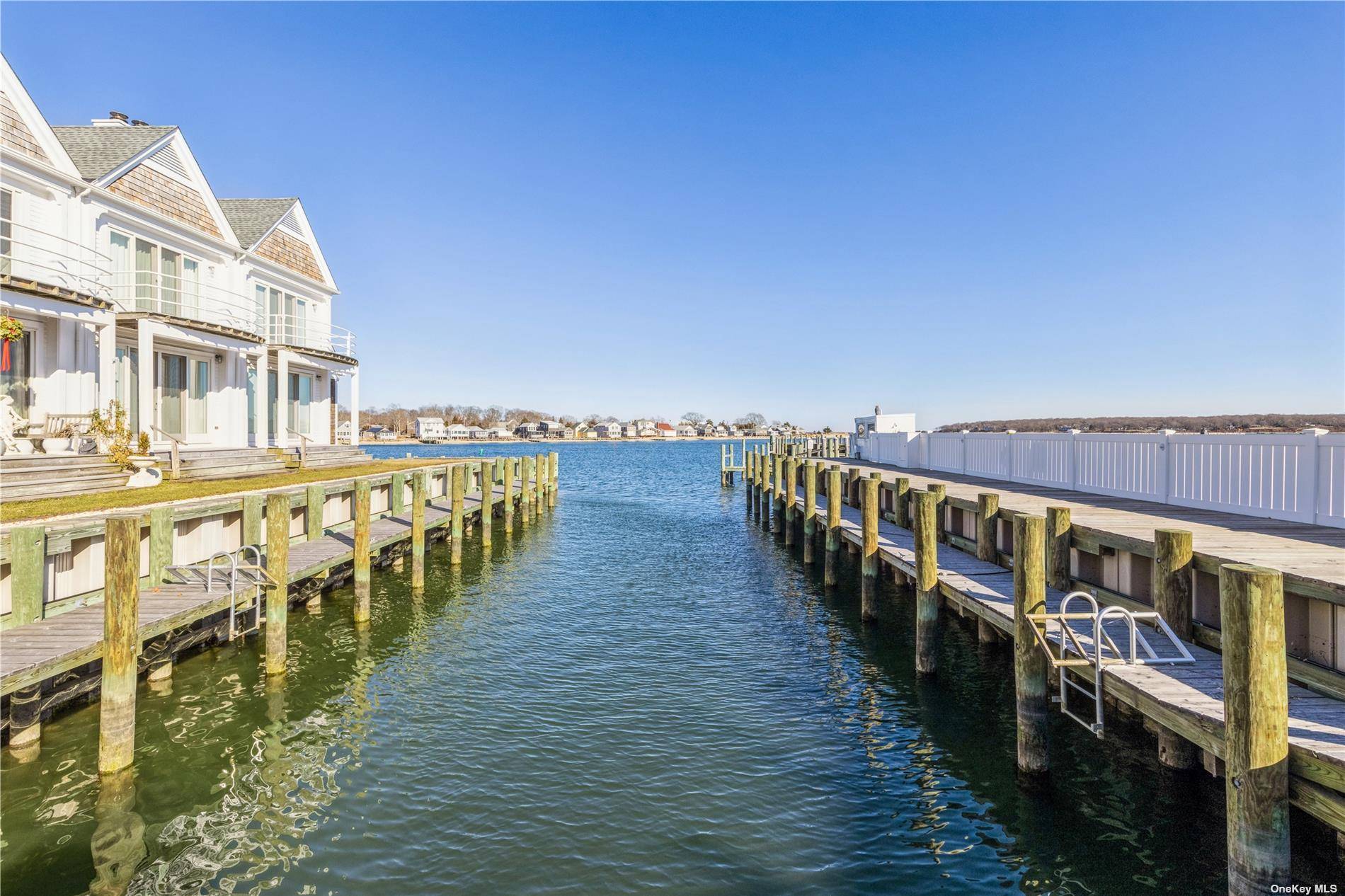 Permit 22 161. Enjoy summer from this newly renovated waterfront condo with the option to bring a boat and enjoy your own deeded slip with access to Peconic Bay !