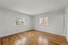 Another view of the primary bedroom