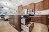 The center island features cabinet storage as well as drawer storage
