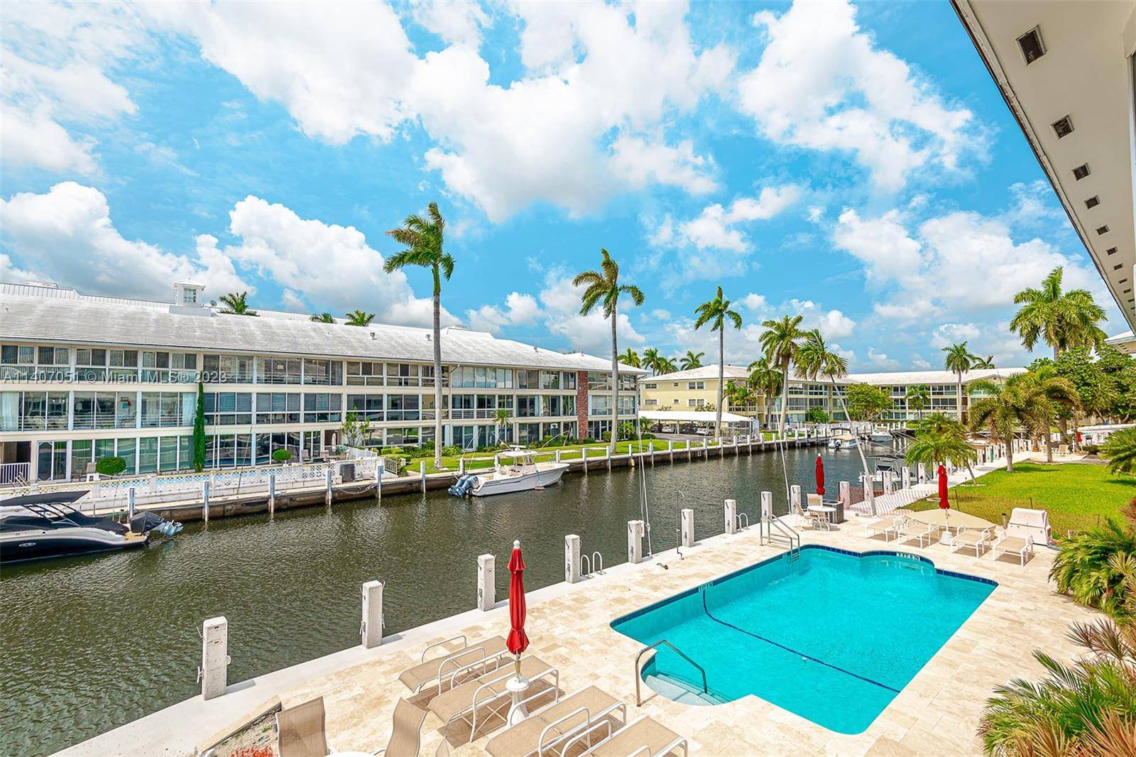 AMAZING FULLY FURNISHED WATERFRONT CONDO IN THE CORAL RIDGE COUNTRY CLUB AREA.