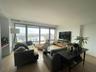 Living area with light wood-style flooring