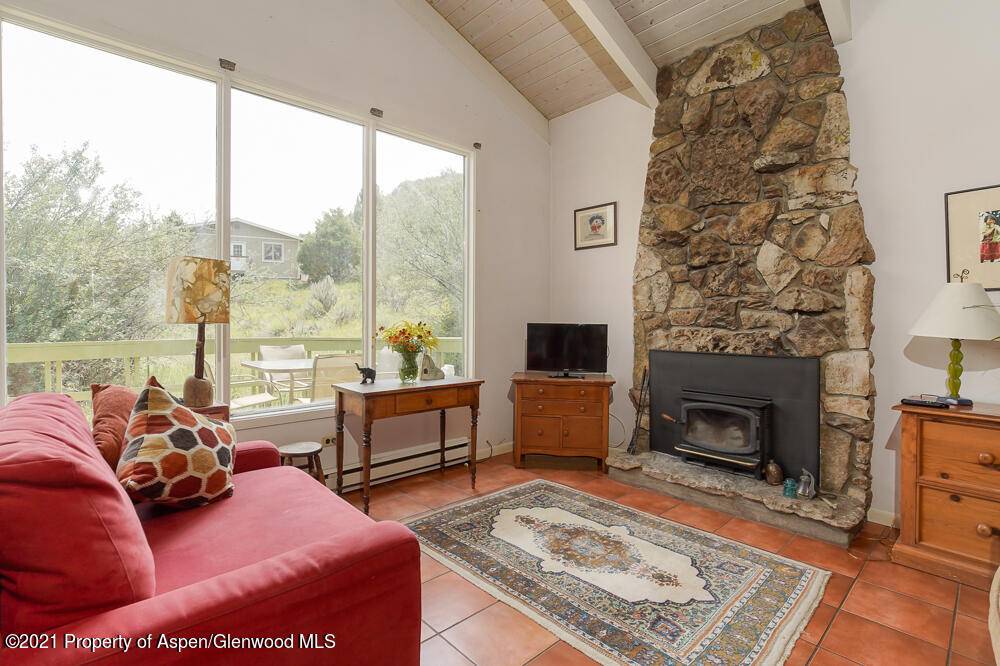 Unique opportunity to purchase a single family cottage on over an acre in Old Snowmass.