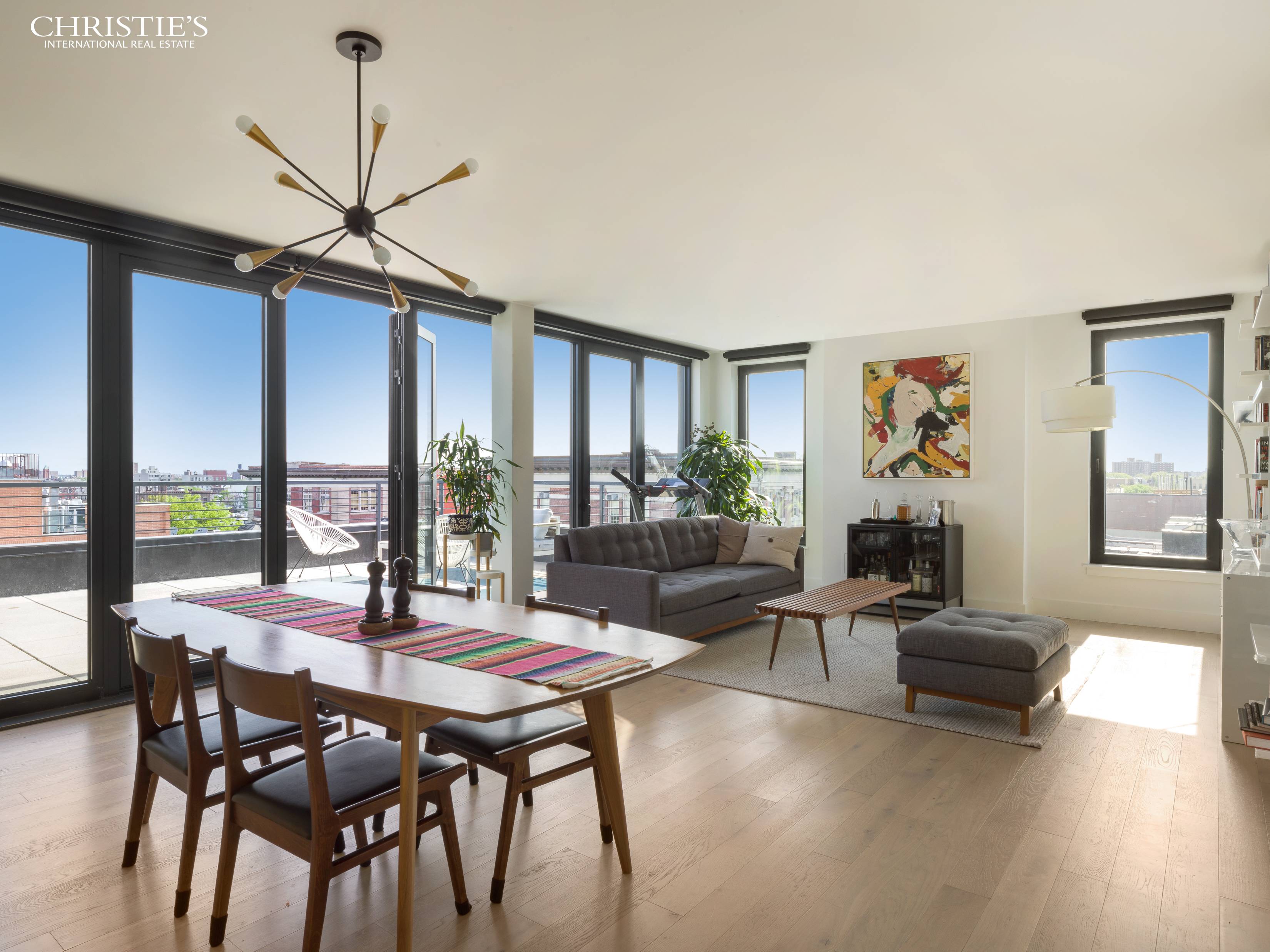 Crown Heights Crown Jewel PH1 at 762 Park Place is a three bedroom, two bathroom with walls of glass offering panoramic views of the Manhattan and downtown Brooklyn skylines.