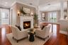 Primary bedroom sitting area virtual staged