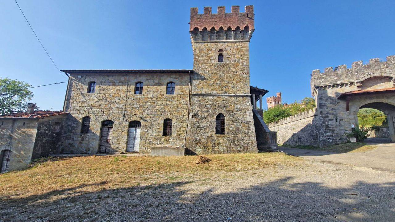 Prestigious castle with 17 ha of land for sale in Arezzo. The property is an example of late 19th century neo-Gothic architecture in Tuscany.