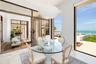 Here you can see the relaxing flow of the covered and screened terrace off the eat-in kitchen. It also flows through from the formal dining room and