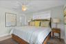 Main floor primary king bedroom with en-suite