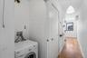 Washroom featuring washer / clothes dryer and hardwood / wood-style floors