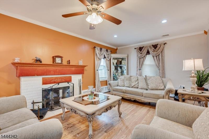 LR with Woodburning Fireplace.