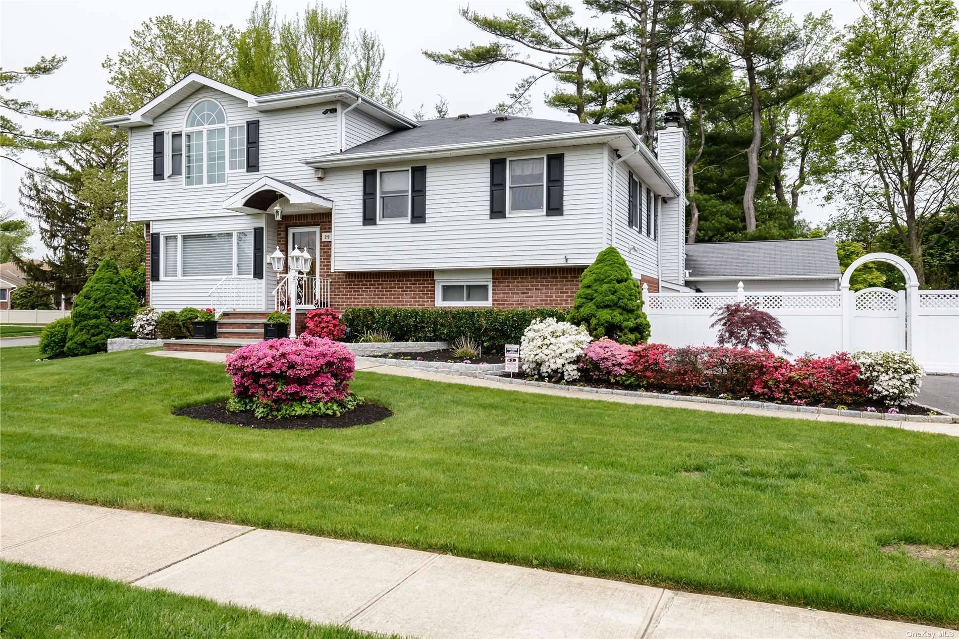 Beautifully Renovated Home In The Sought After North Syosset Area Of Flower Hill With Easy Access To Town, Shops and LIRR.