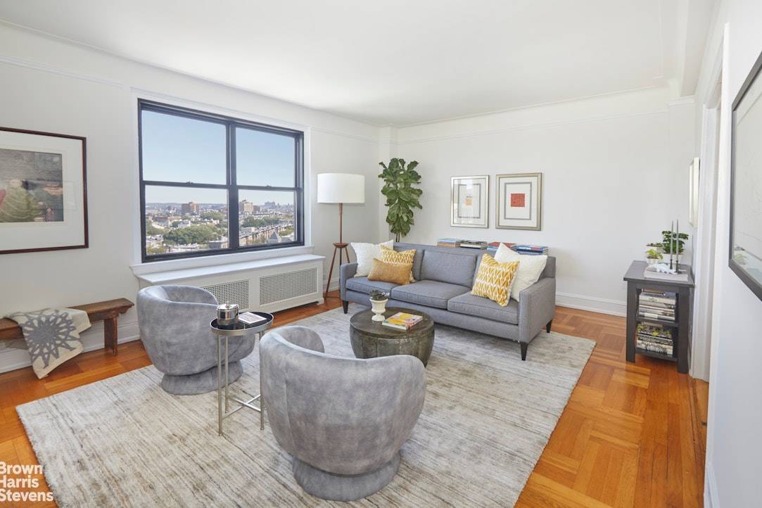 Windows surround you in this top floor residence at this beautiful pre war Plaza Street elevator cooperative.
