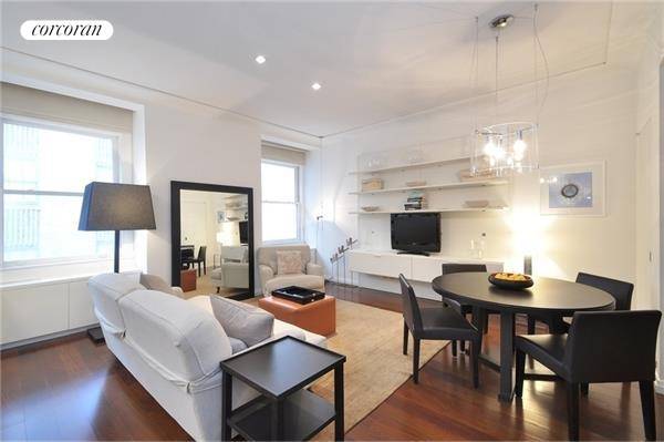 Welcome to Residence 828 at 55 Wall Street, a bright and spacious 886 square foot furnished loft located in the prestigious Cipriani Club Residences.
