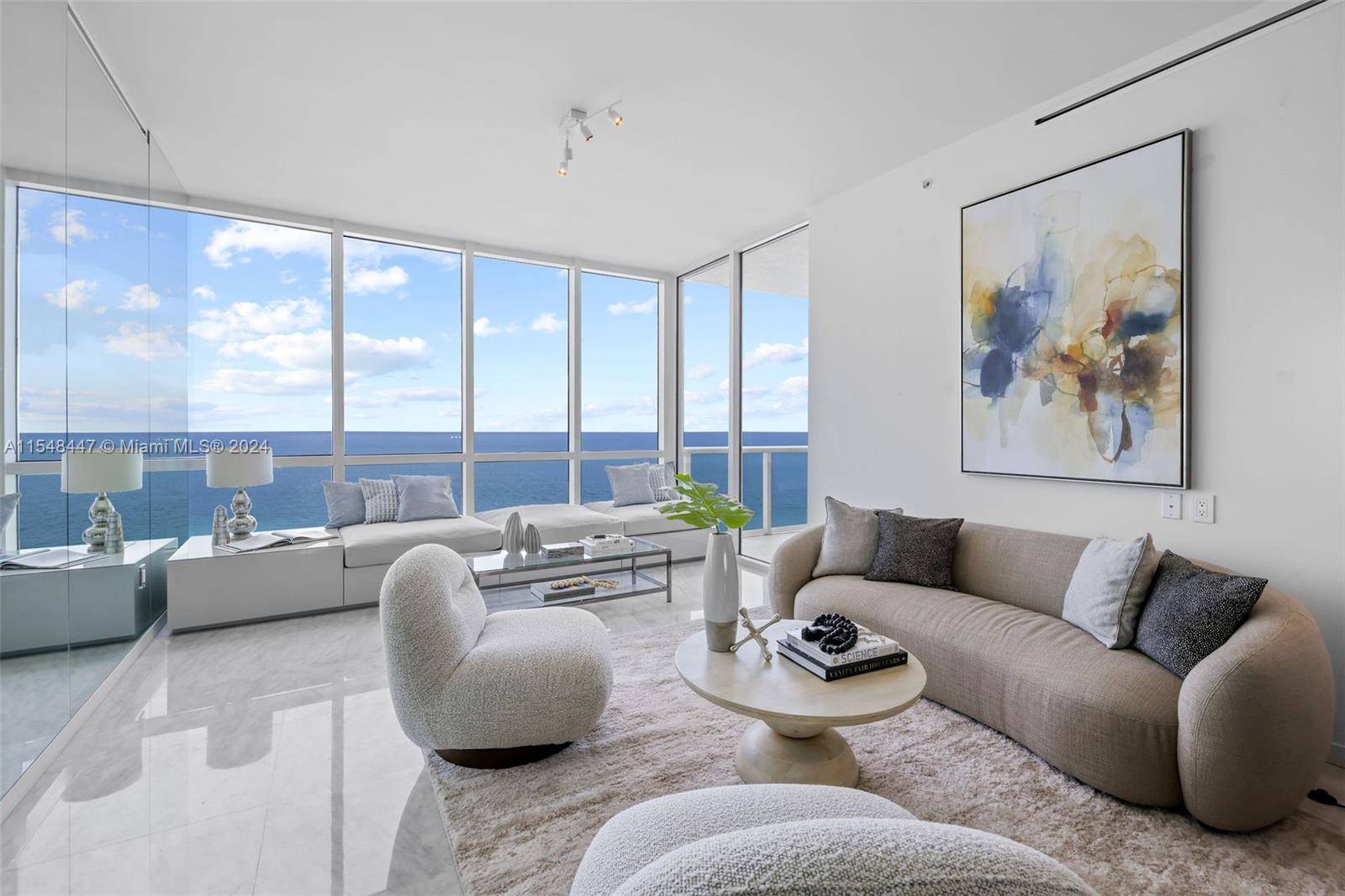 Indulge in coastal elegance at this ultra luxury oceanfront condo.