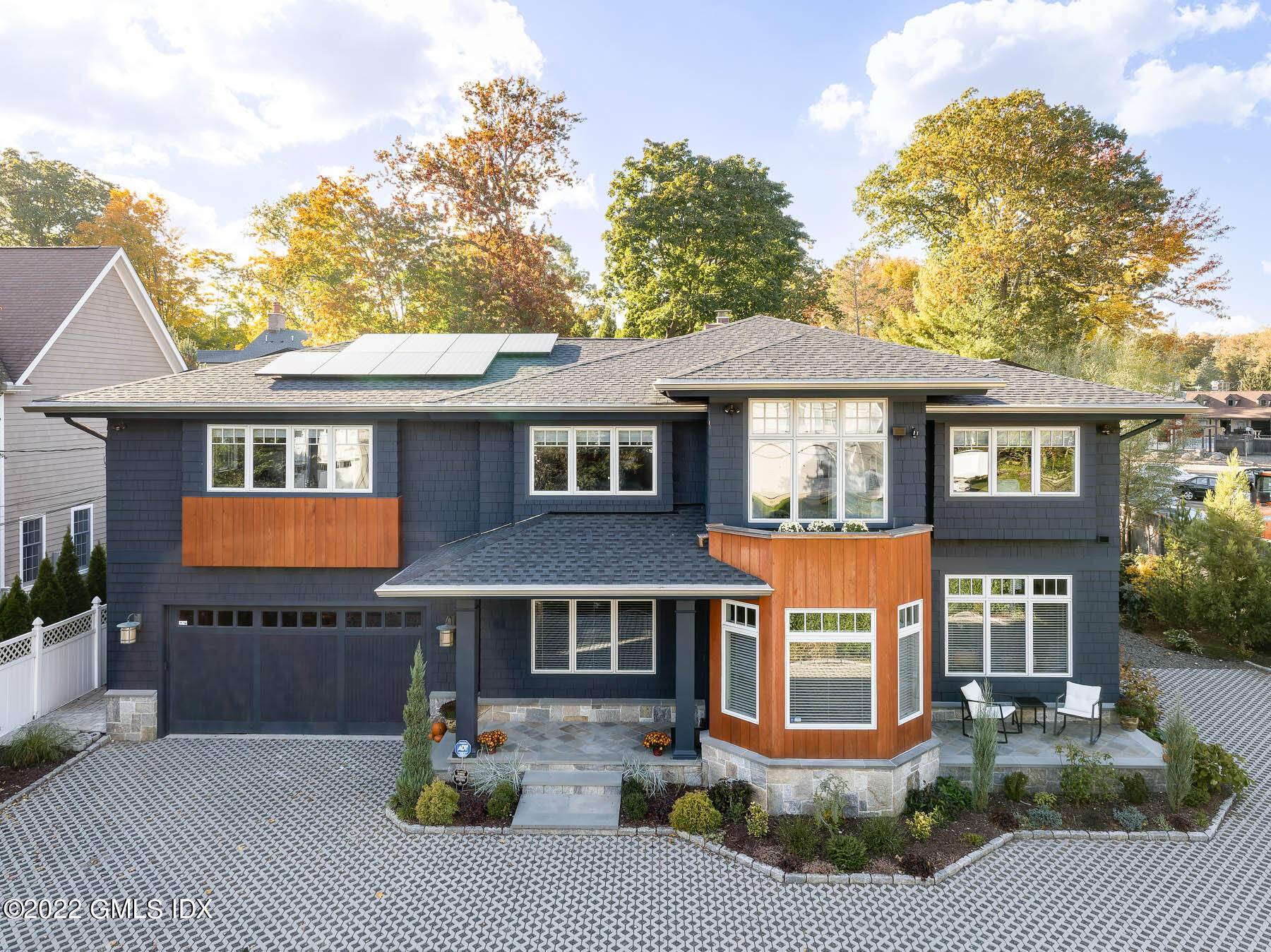 In town, spacious and modern craftsman style home with open flow layout, on level.