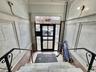 Entrance foyer featuring crown molding