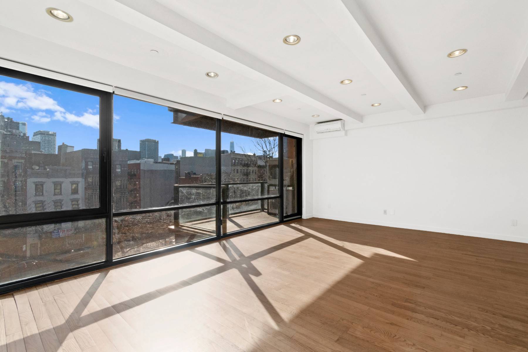 Perched on the fifth floor with incredible views of Lower Manhattan, this floor through two bedroom, one bathroom residence enjoys generous sun drenched rooms and a gracious balcony.