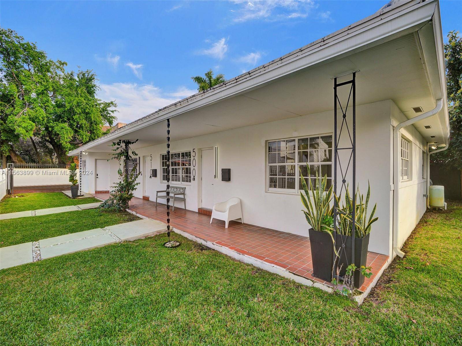Welcome to your charming oasis in the heart of Miami's historic Palm Grove neighborhood !