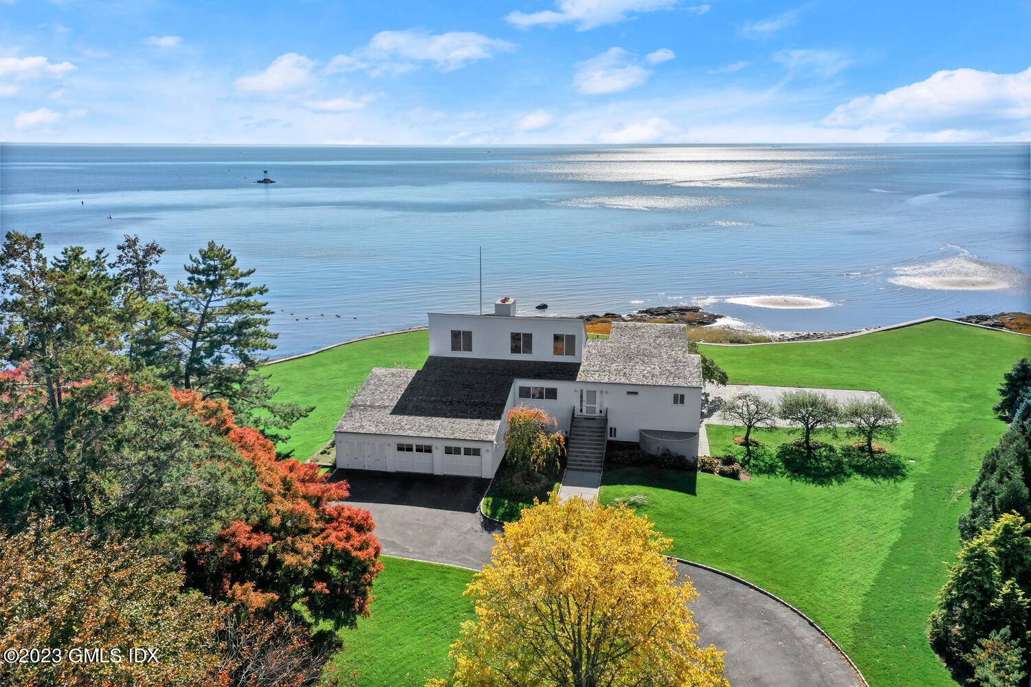 SOUTHPORT WATERFRONT SPECTACULAR ROCK POINT ON LI SOUND With a sensational Long Island Sound location, at the mouth of idyllic Southport Harbor, this spectacular 1.