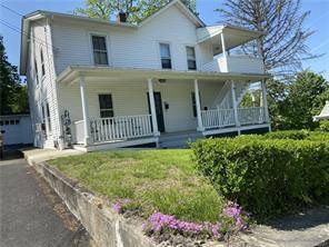Well Cared Maintained Multifamily Home on large corner lot.