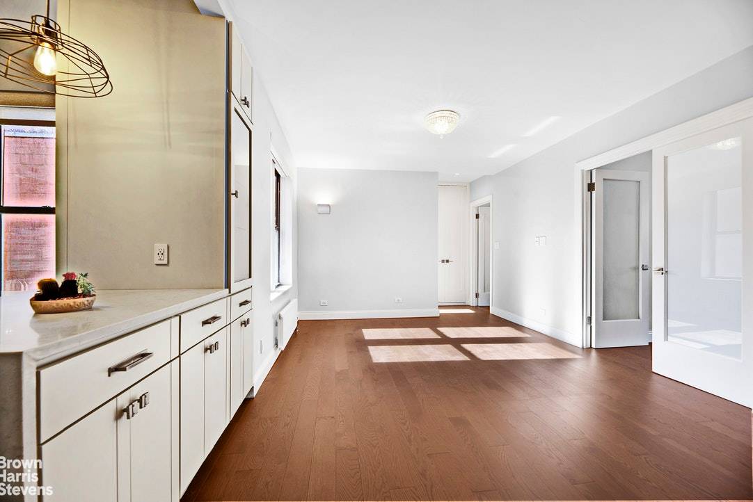 Perched on the top floor of a beautiful boutique style Carnegie Hill building, apartment 6A has been professionally renovated down to the studs !