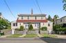 Check Out This Legal Two Family Home With Two Garages and Two Private Entrances